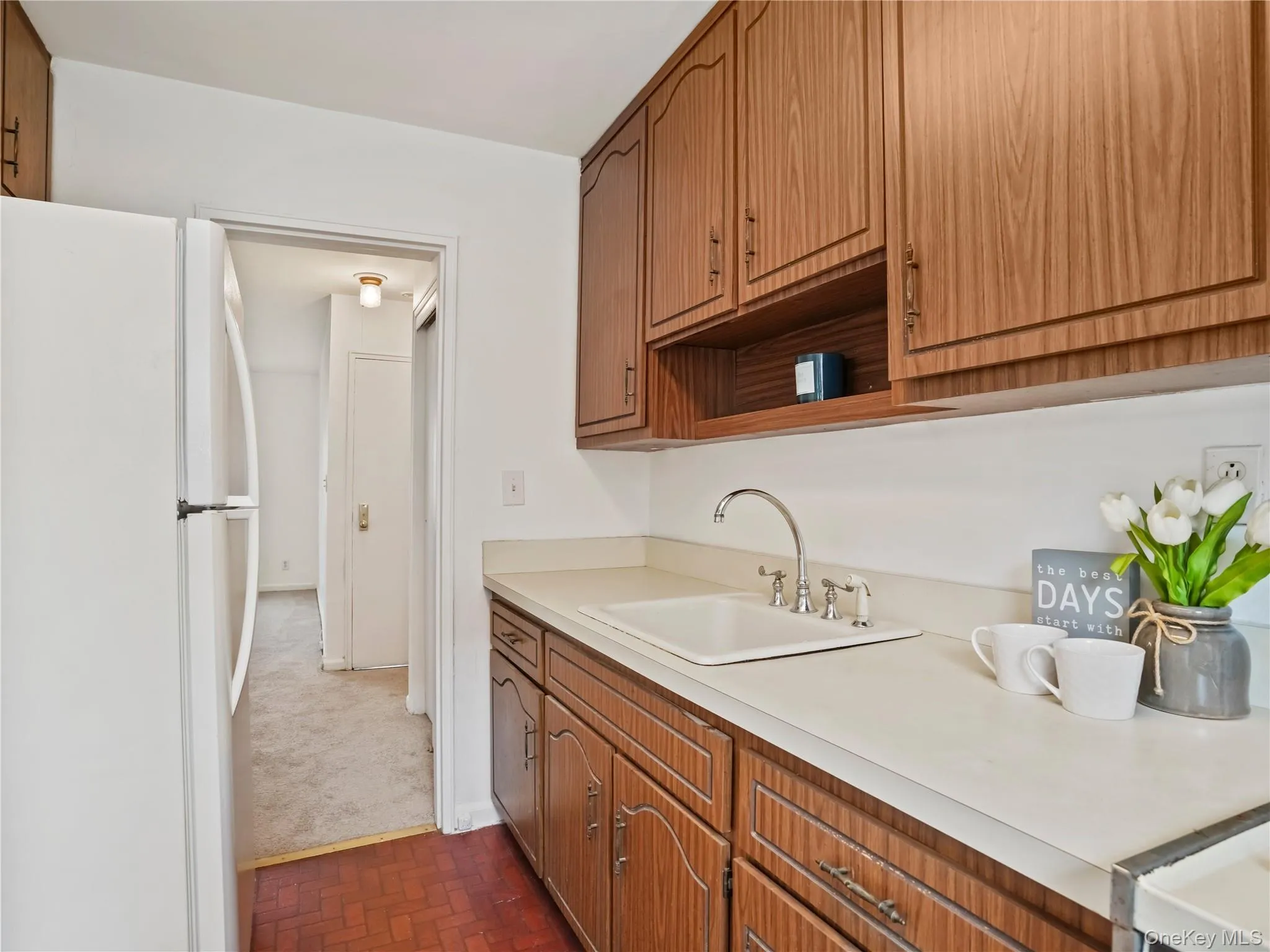 Kitchen featuring plenty of cabinet space, refrigerator, oven and microwave. Kitchen featuring plenty of cabinet space, refrigerator, oven and microwave.