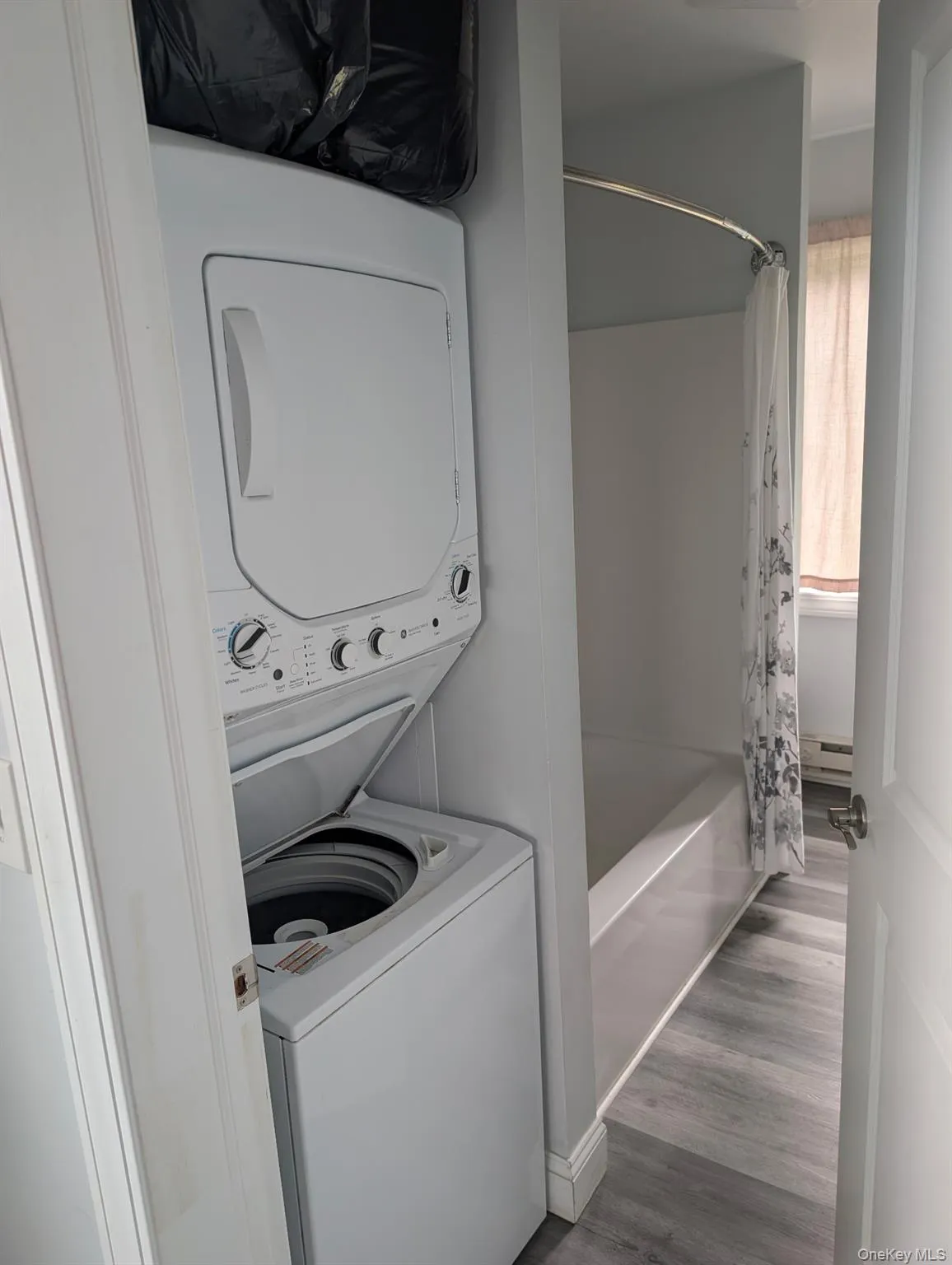Bathroom with washer and dryer Bathroom with washer and dryer