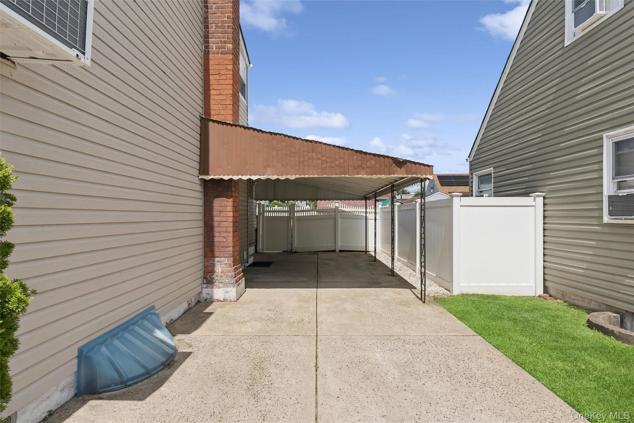 Driveway with covered entrance to the house Driveway with covered entrance to the house