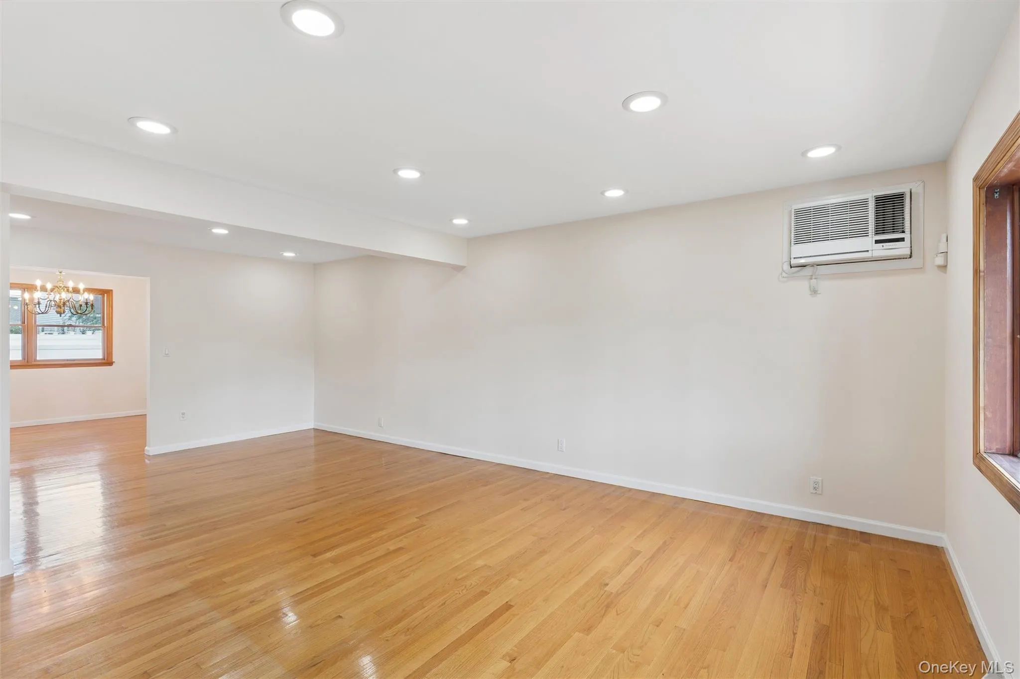 Large living space with hardwood floors Large living space with hardwood floors