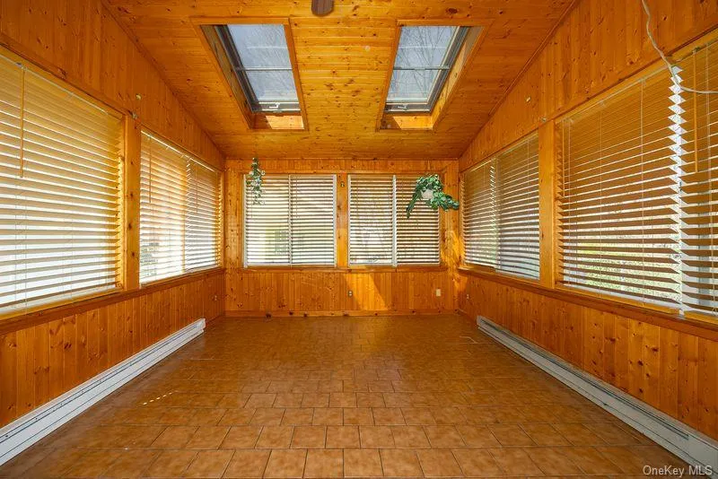 large family room, tile floor, beautiful windows over look back yard large family room, tile floor, beautiful windows over look back yard