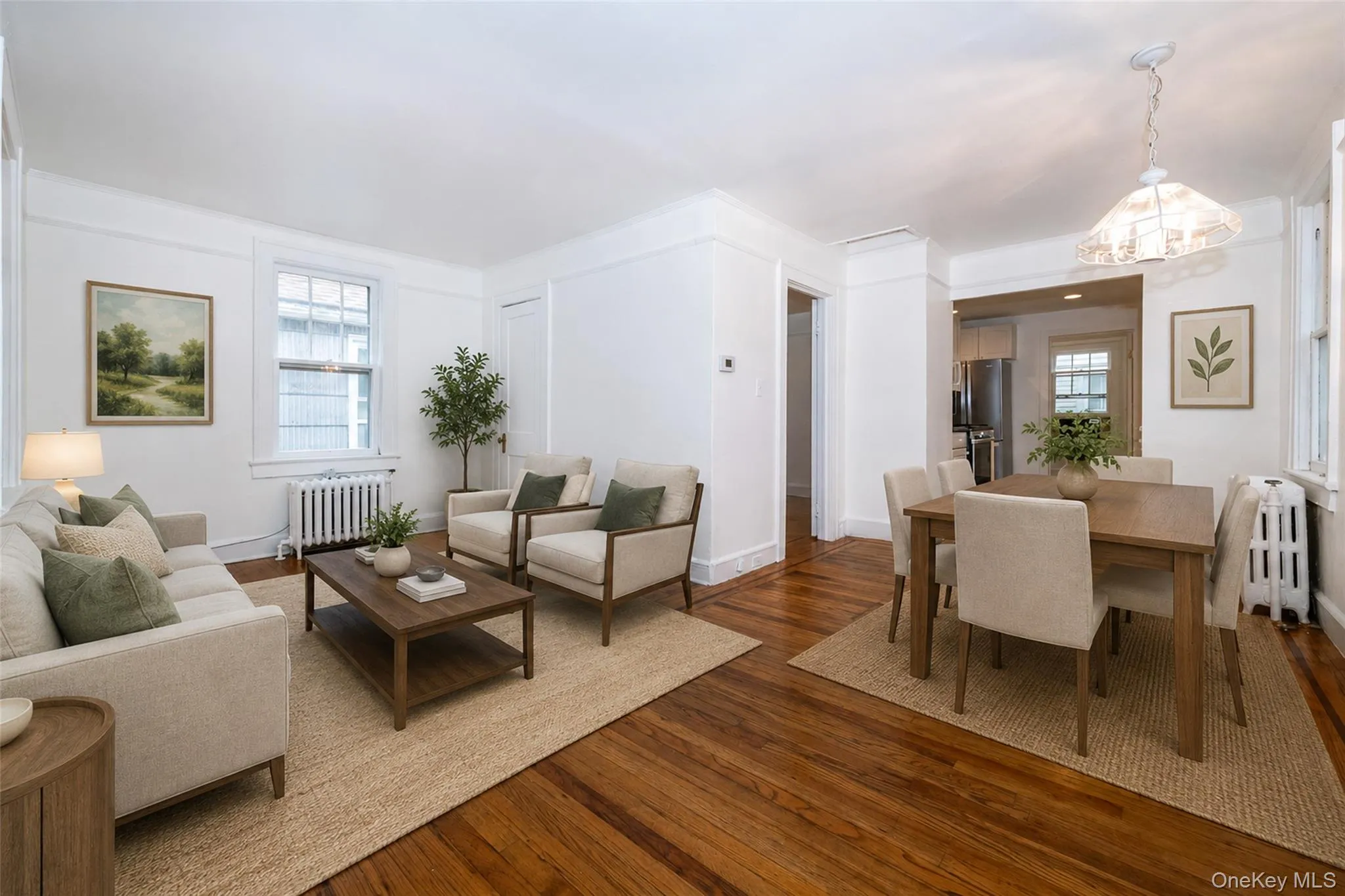 virtually staged.Living room/with dining area virtually staged.Living room/with dining area