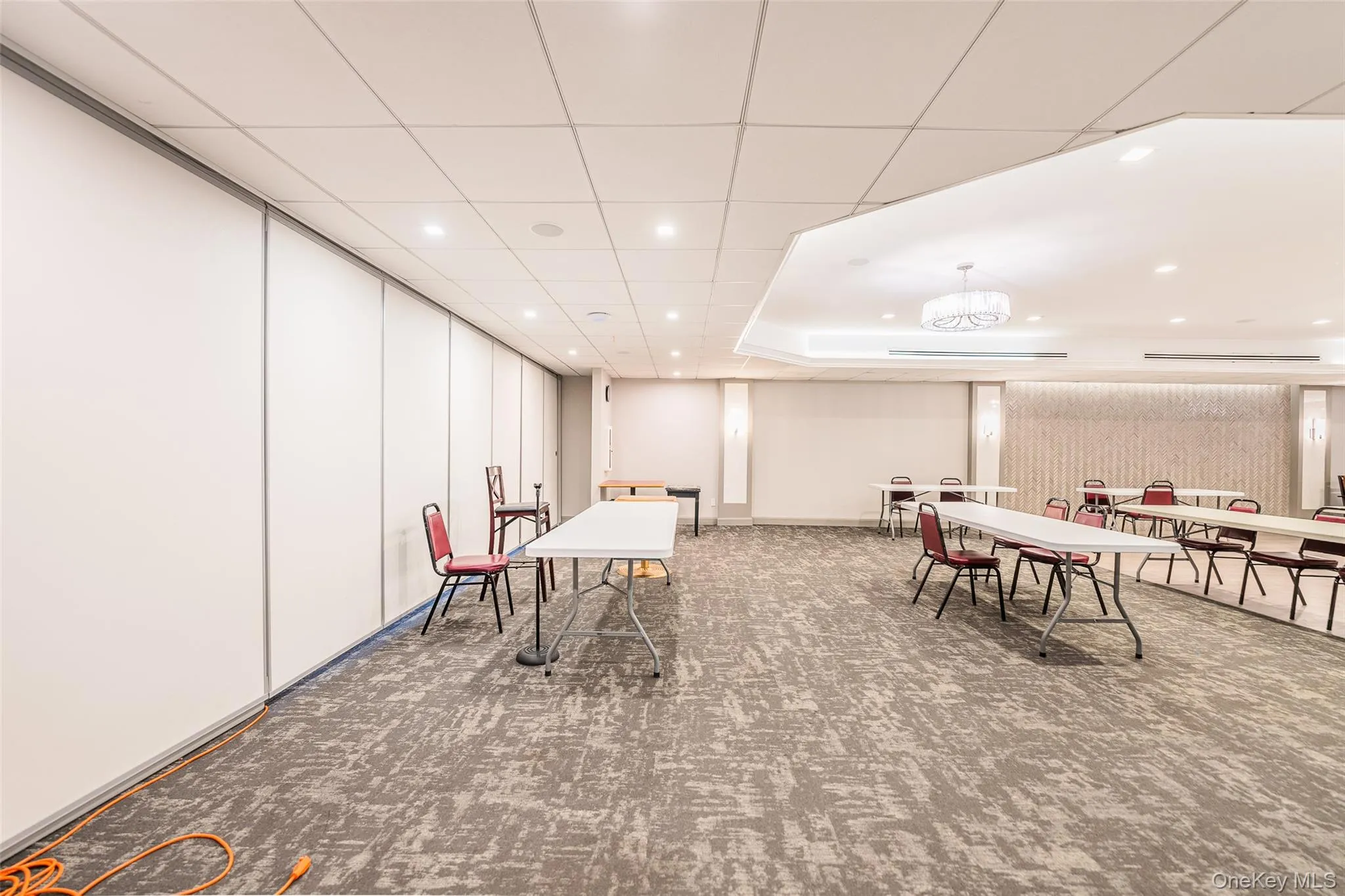 Dining space with carpet floors and recessed lighting Dining space with carpet floors and recessed lighting