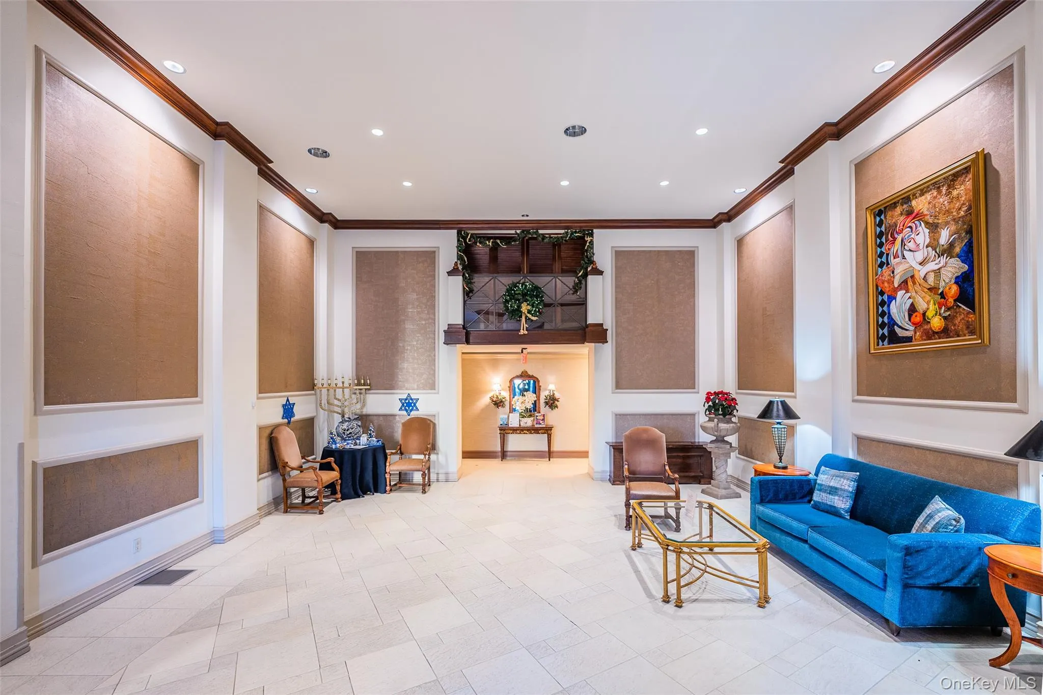 Community lobby with crown molding and recessed lighting Community lobby with crown molding and recessed lighting