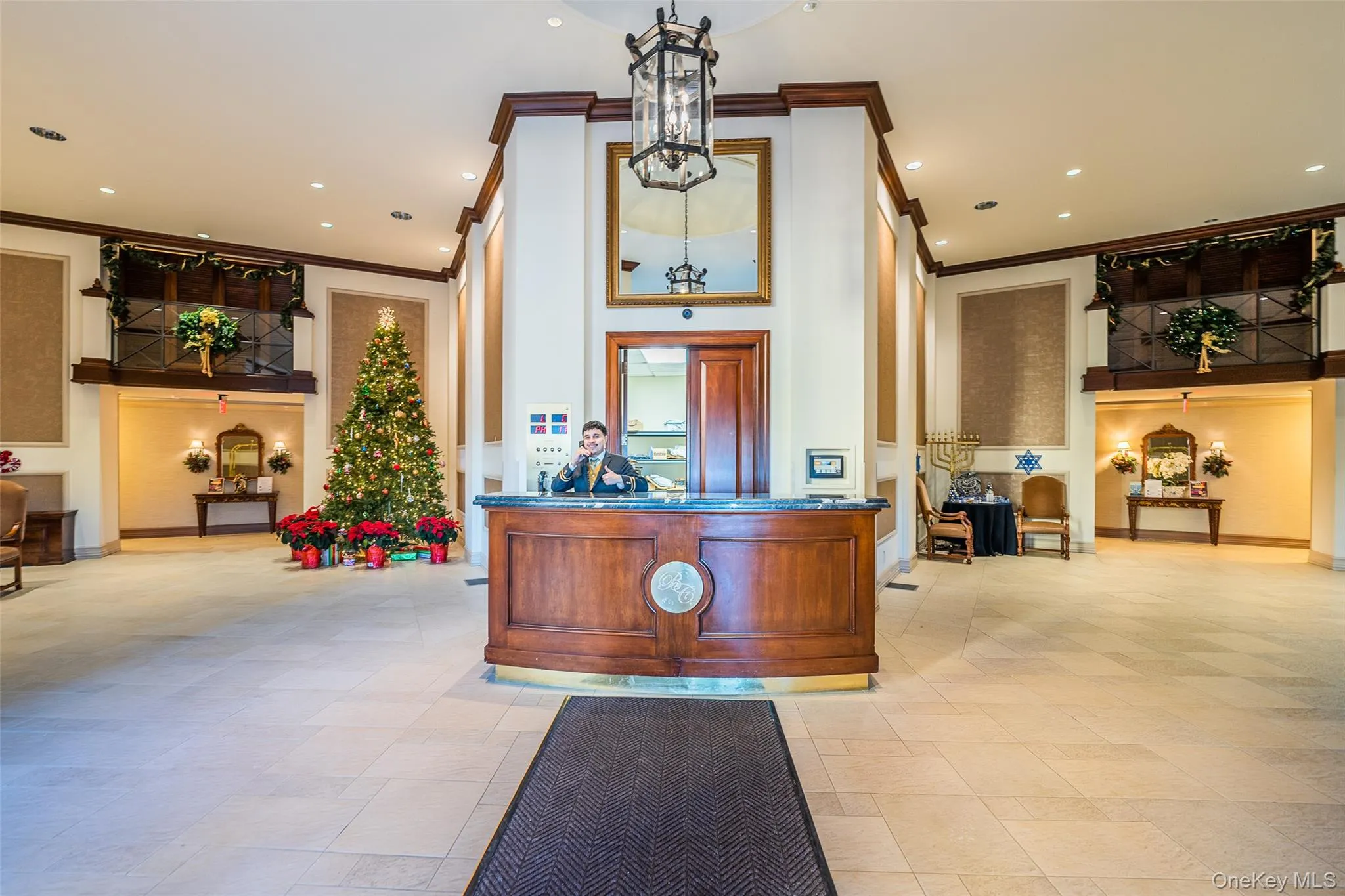 Reception featuring ornamental molding and recessed lighting Reception featuring ornamental molding and recessed lighting