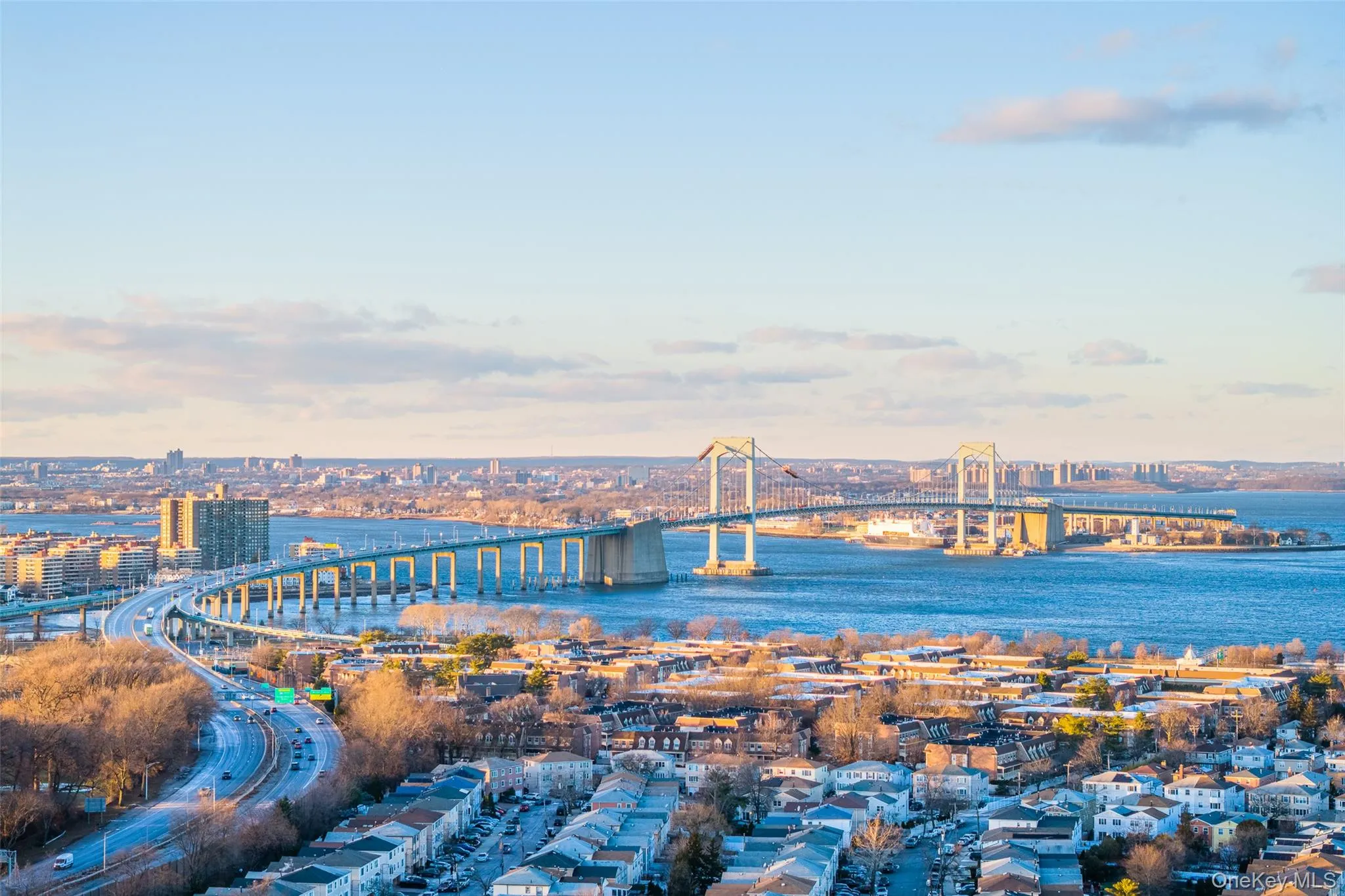 Water view with nearby urban area and a notable bridge Water view with nearby urban area and a notable bridge