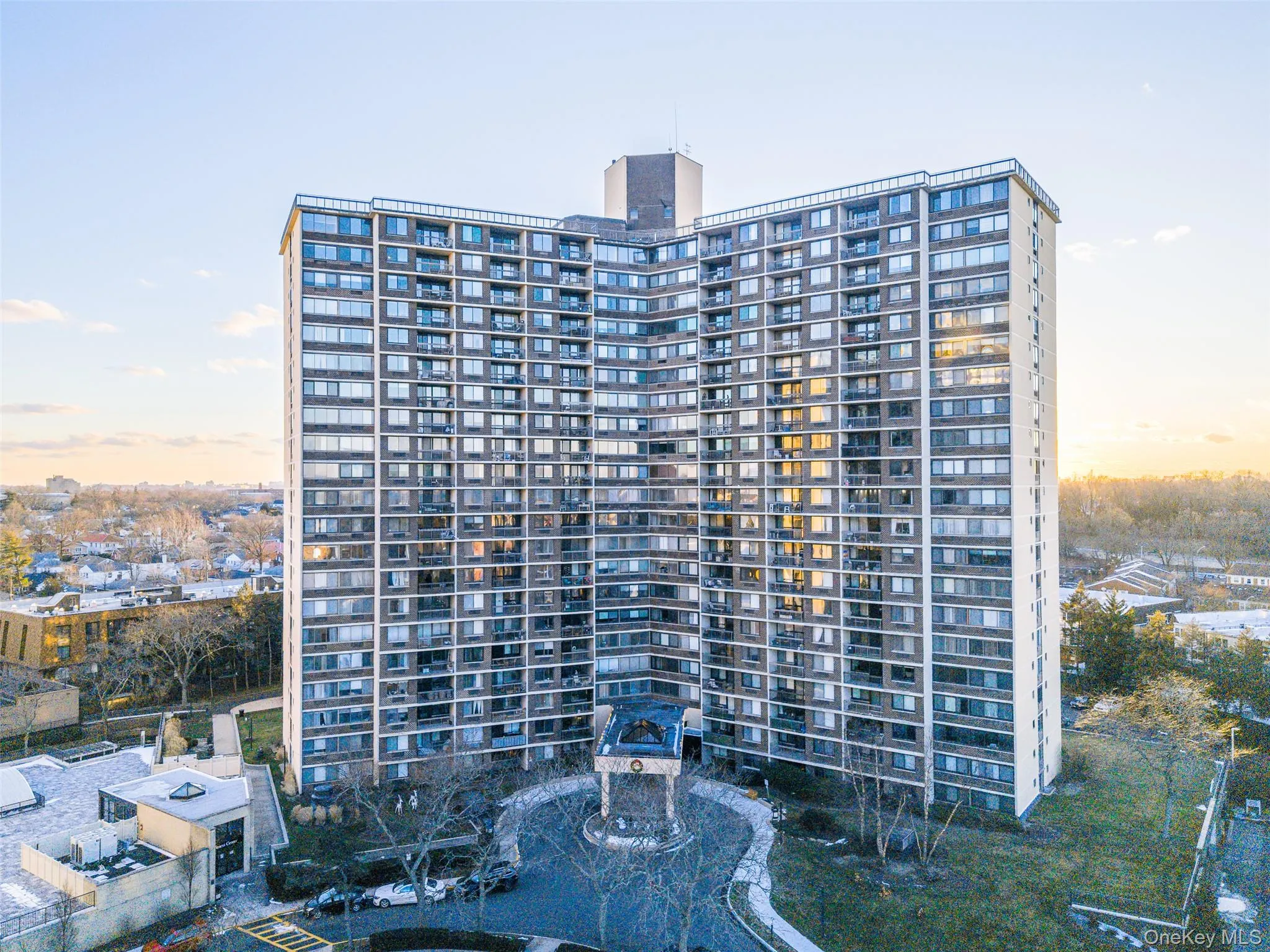 Property at dusk featuring a view of apartment building / complex Property at dusk featuring a view of apartment building / complex