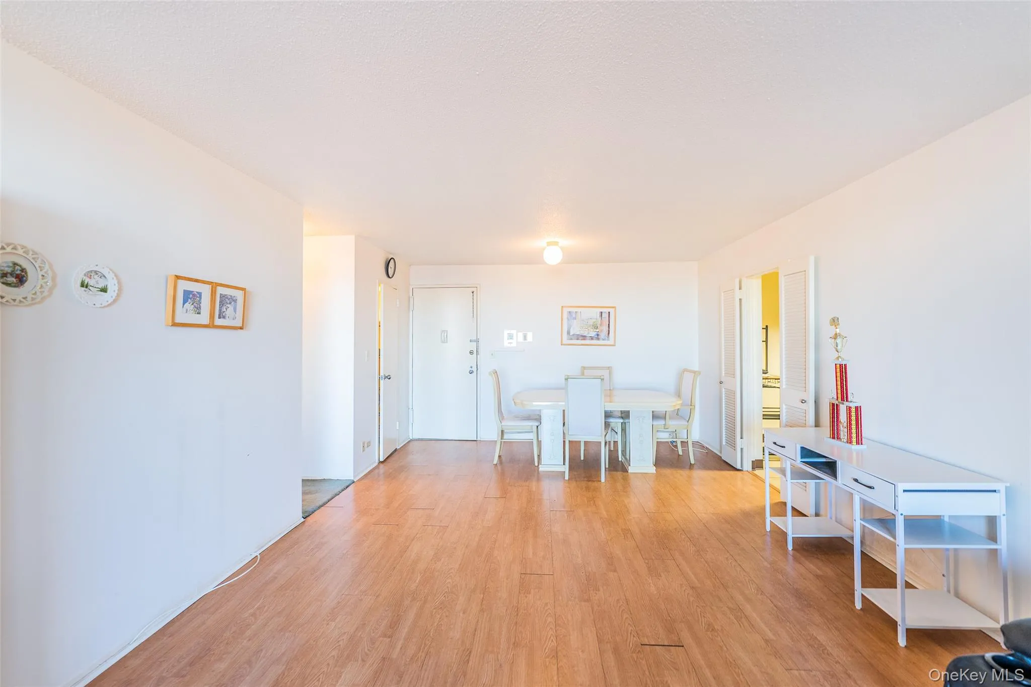 Dining space featuring light wood-style flooring Dining space featuring light wood-style flooring