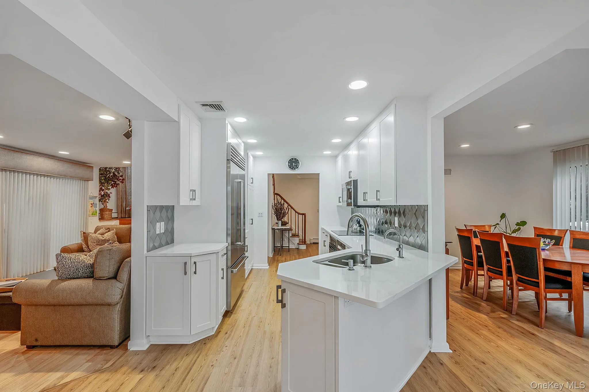 With open layout to dining room and den With open layout to dining room and den