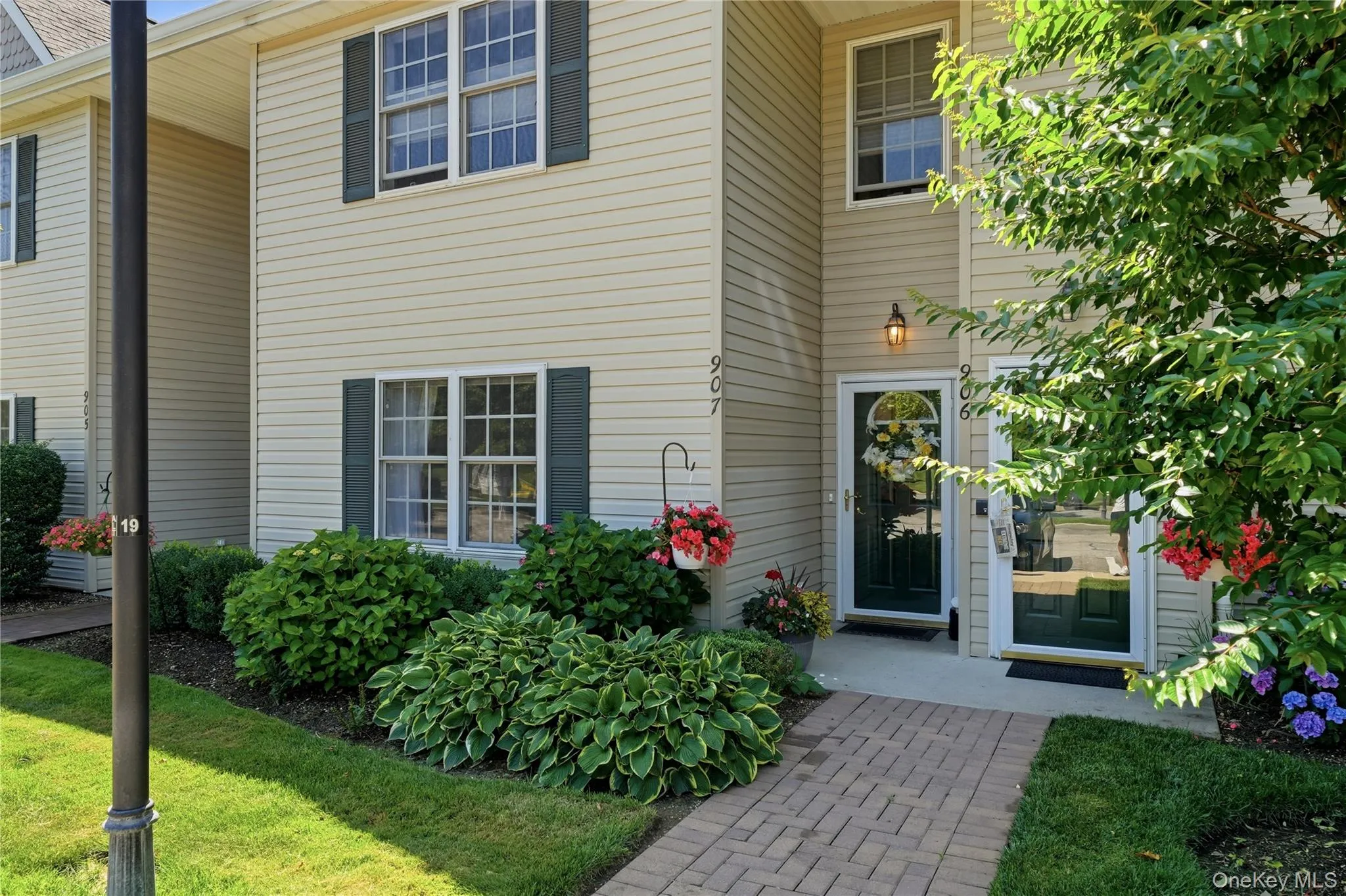 Nicely Manicured, Vinyl Siding with Storm Door Nicely Manicured, Vinyl Siding with Storm Door
