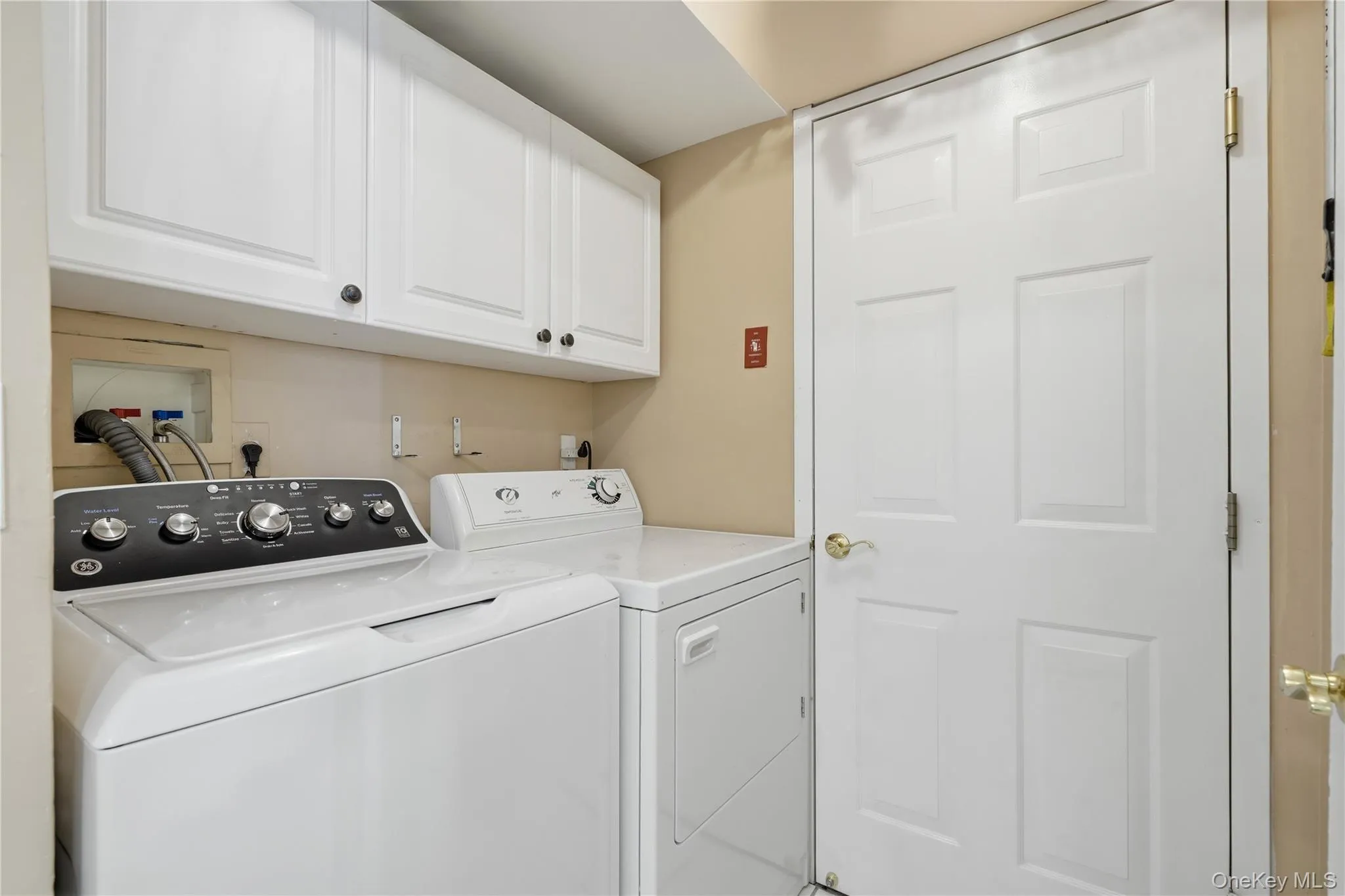 In Unit Laundry Room with door to Utility Room In Unit Laundry Room with door to Utility Room