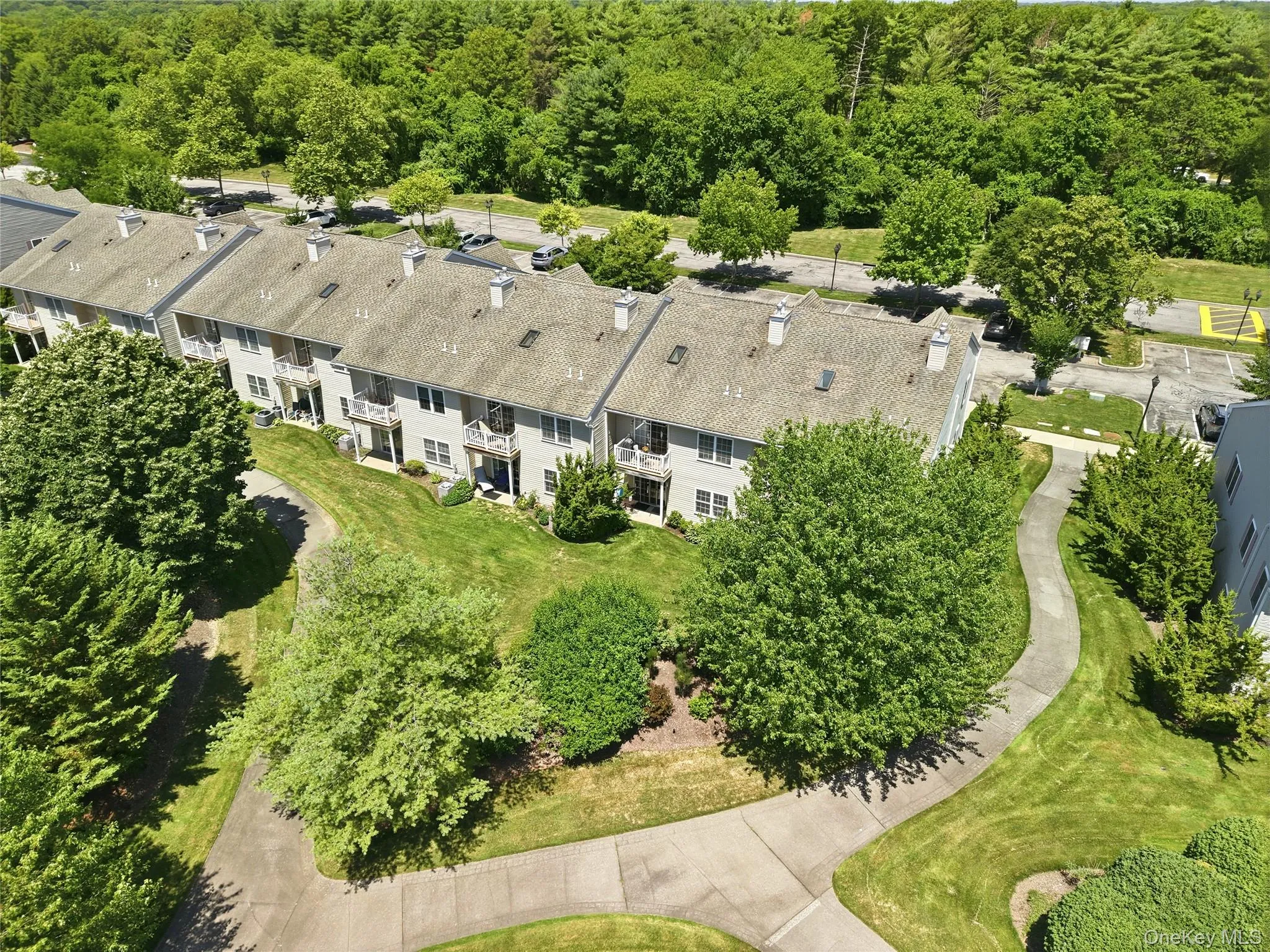 Aerial View Back of Unit w/ Walking paths Aerial View Back of Unit w/ Walking paths