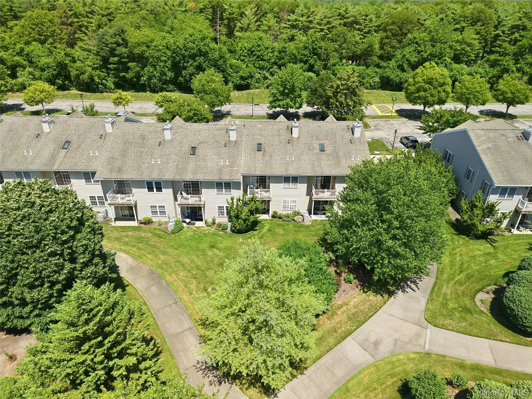 Aerial View Back of Unit w/ Walking paths Aerial View Back of Unit w/ Walking paths