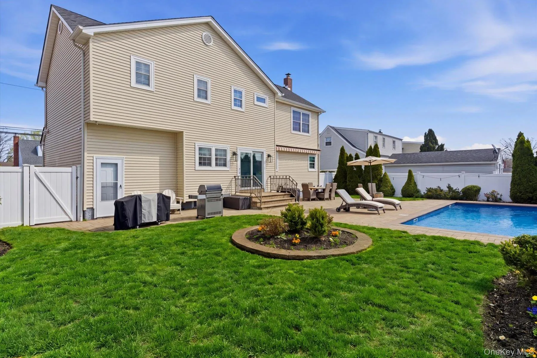 Landscaped backyard with pool Landscaped backyard with pool
