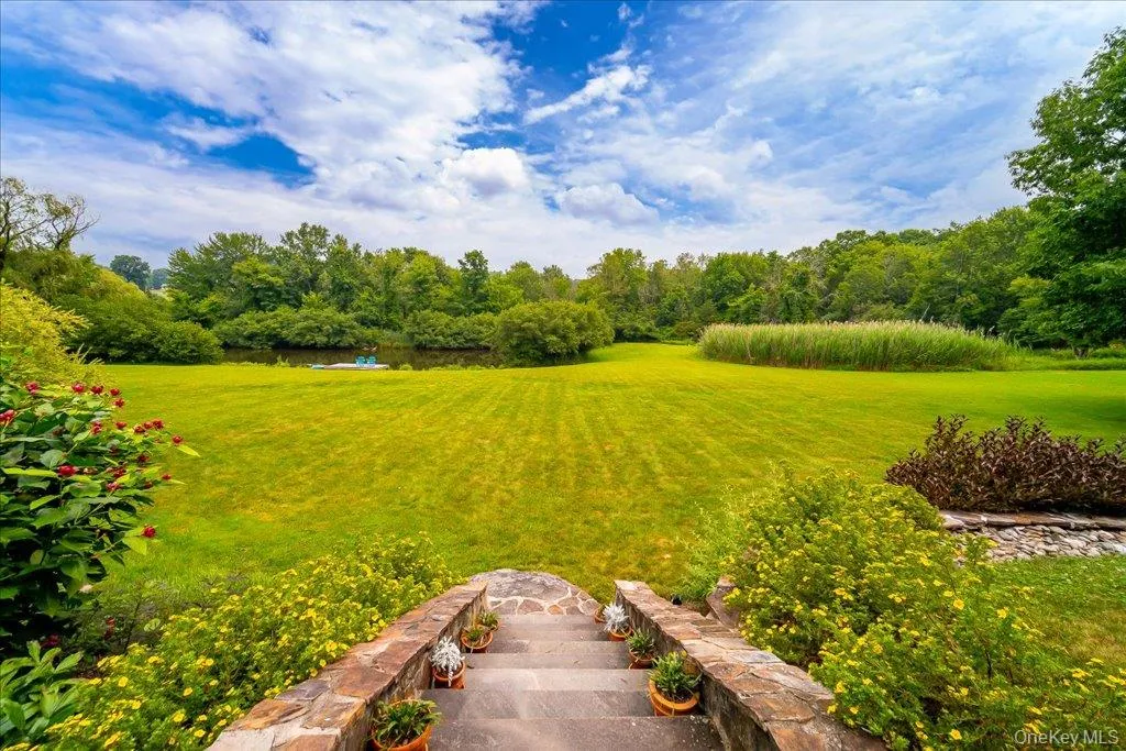 Step down to your expansive open yard.. plenty of room for yard activities or a stroll. Step down to your expansive open yard.. plenty of room for yard activities or a stroll.