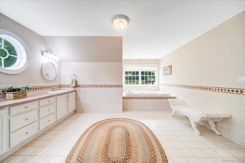 Plenty of light and space in this lovely primary bathroom complete with standup shower, oversized double vanity, toilet area and soaking tub. Plenty of light and space in this lovely primary bathroom complete with standup shower, oversized double vanity, toilet area and soaking tub.