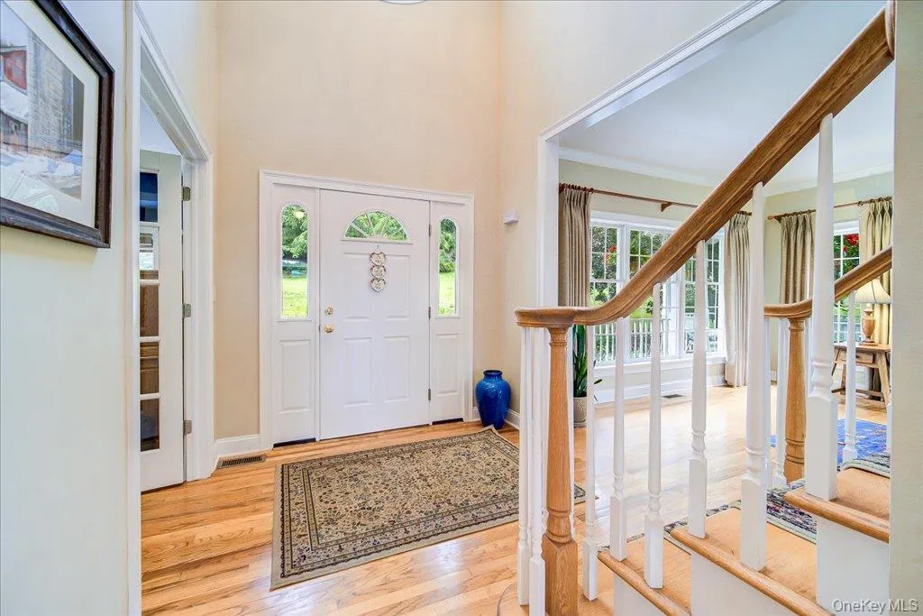Step inside to your over 5,000 sq. foot home overlooking your stately grounds complete with dock, pond and private island! Step inside to your over 5,000 sq. foot home overlooking your stately grounds complete with dock, pond and private island!