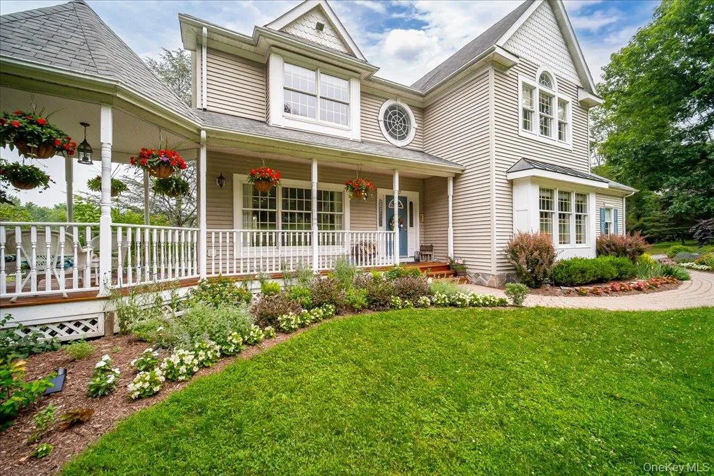 The lovely side porch gazebo overlooks your front and back yard.. Wonderful for morning coffee or relaxing in the evening. The lovely side porch gazebo overlooks your front and back yard.. Wonderful for morning coffee or relaxing in the evening.