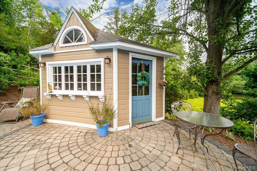 This darling pool house/cabana can be enjoyed as it is or easily converted into a fantastic outdoor bar area for entertaining. This darling pool house/cabana can be enjoyed as it is or easily converted into a fantastic outdoor bar area for entertaining.