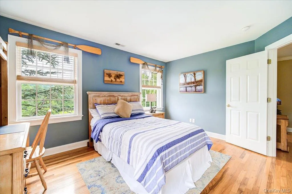 One of 4 bedrooms well designed to be spacious with plenty of windows and large double closets. One of 4 bedrooms well designed to be spacious with plenty of windows and large double closets.