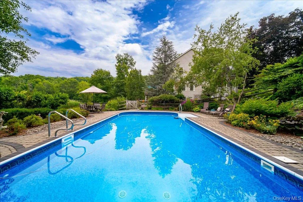 Enjoy your luxury 18X40 in-ground pool with custom landscape and paver surround. Enjoy your luxury 18X40 in-ground pool with custom landscape and paver surround.