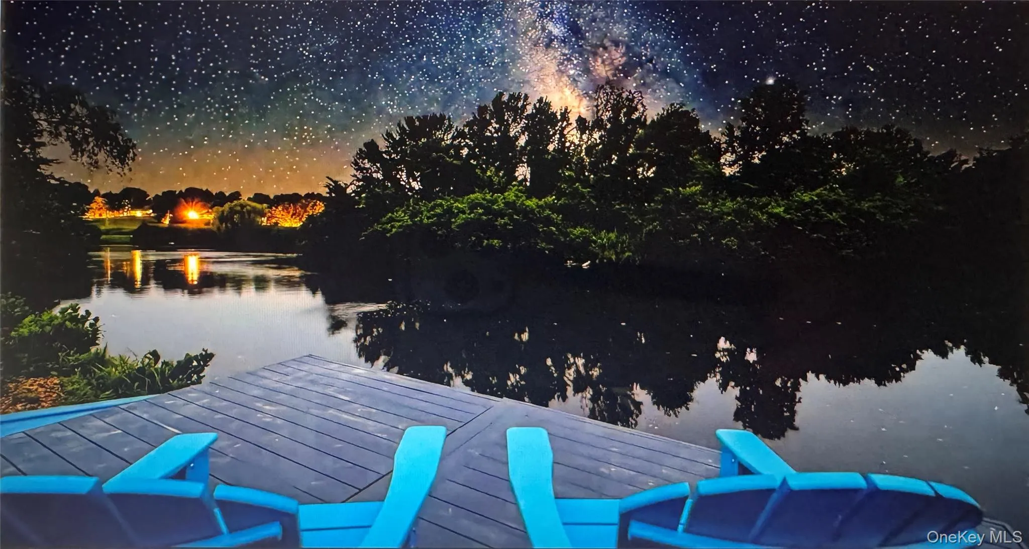 Enjoy starry evenings from your own backyard dock overlooking the private pond and island. Enjoy starry evenings from your own backyard dock overlooking the private pond and island.
