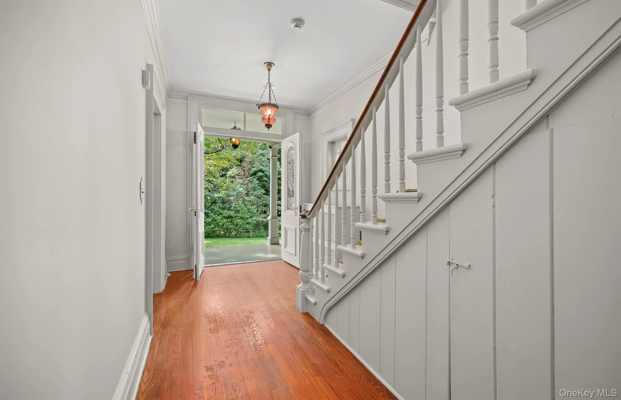 Front Entryway with Front Staircase from Porch Front Entryway with Front Staircase from Porch