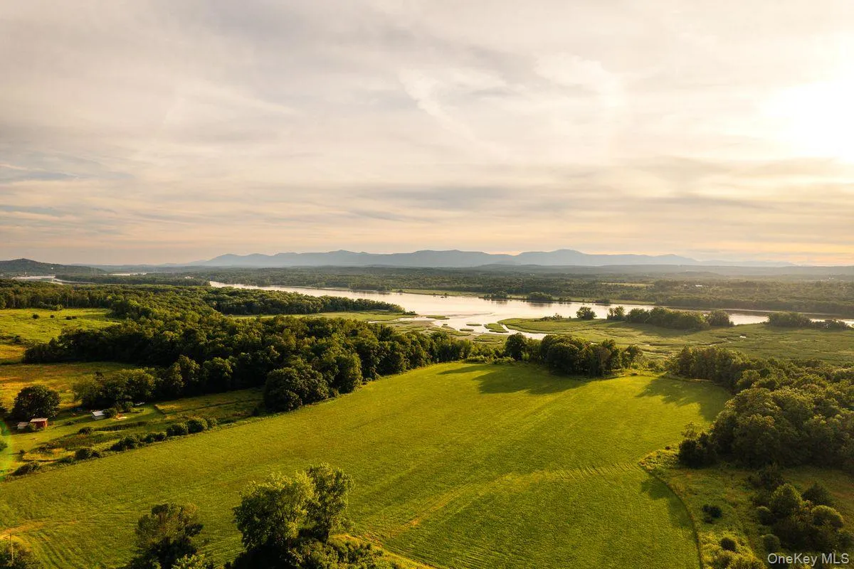 Bird's eye view with a rural view and a water and mountain view Bird's eye view with a rural view and a water and mountain view