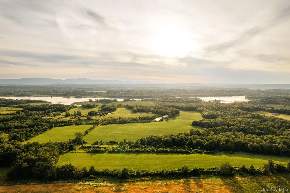 Bird's eye view with a water and mountain view Bird's eye view with a water and mountain view
