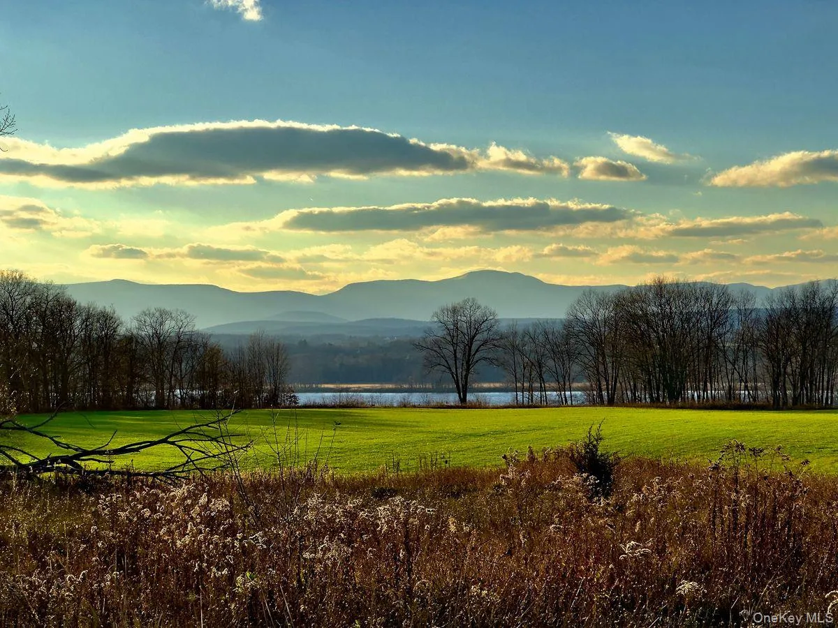Property view of mountains featuring a water view Property view of mountains featuring a water view
