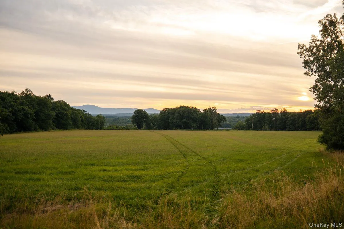 Yard at dusk featuring a rural view Yard at dusk featuring a rural view