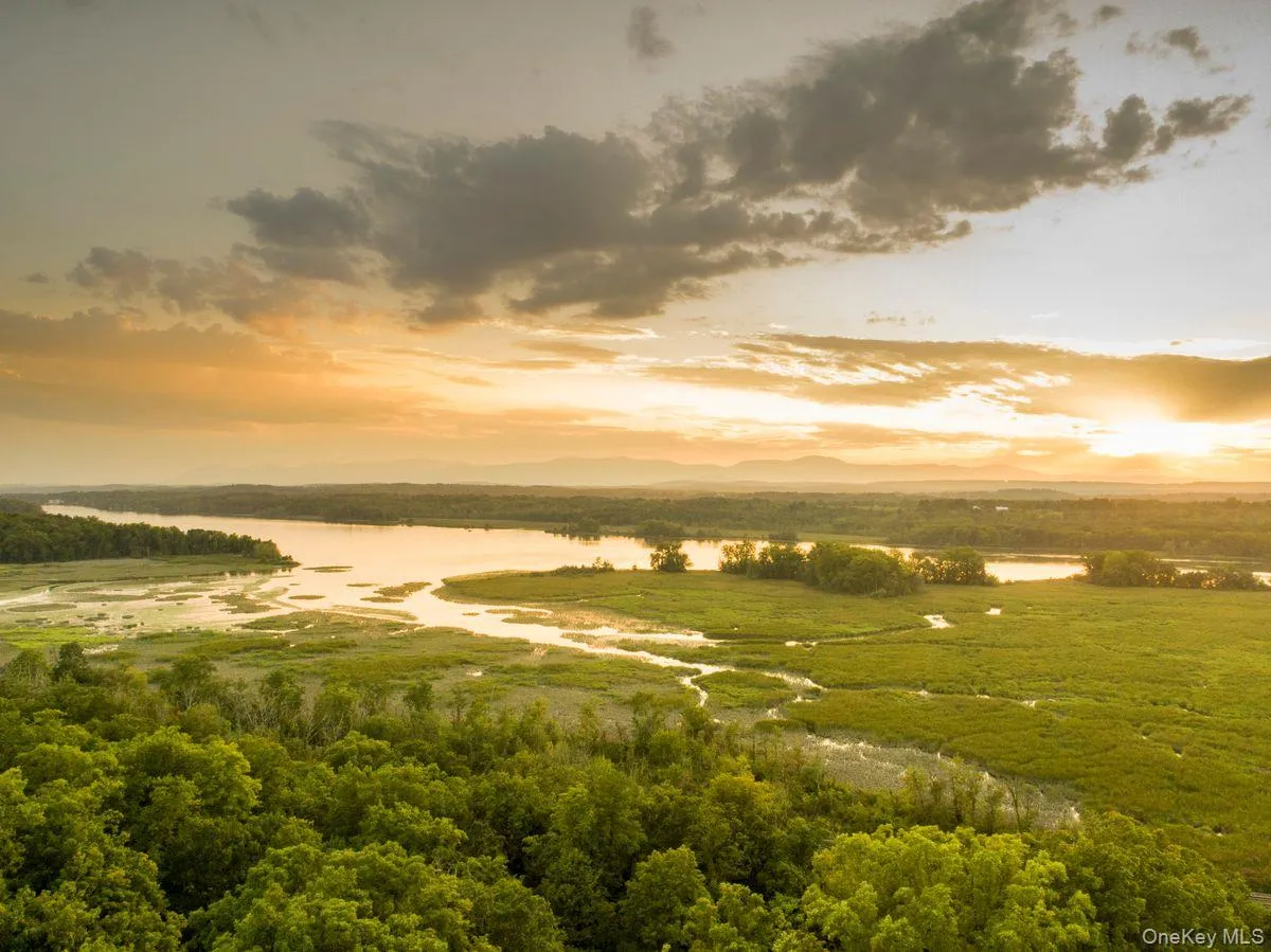 Aerial view at dusk with a water view Aerial view at dusk with a water view