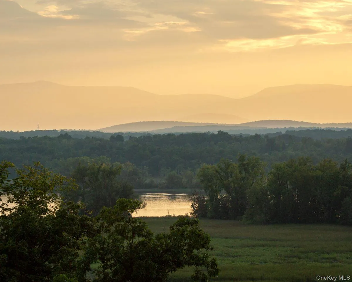 Mountain view with a water view and a forest view Mountain view with a water view and a forest view