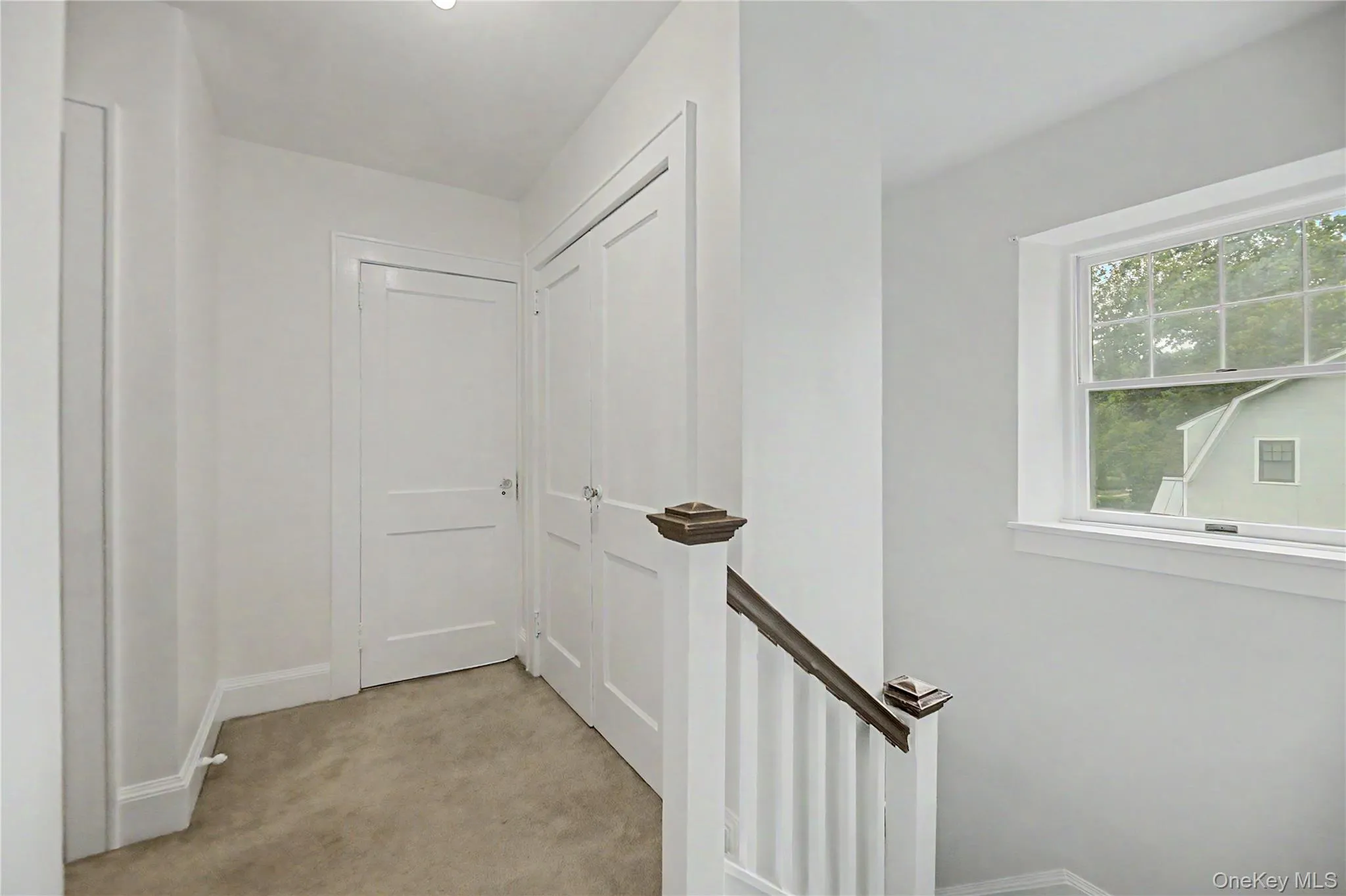 Landing with oversized linen closet Landing with oversized linen closet