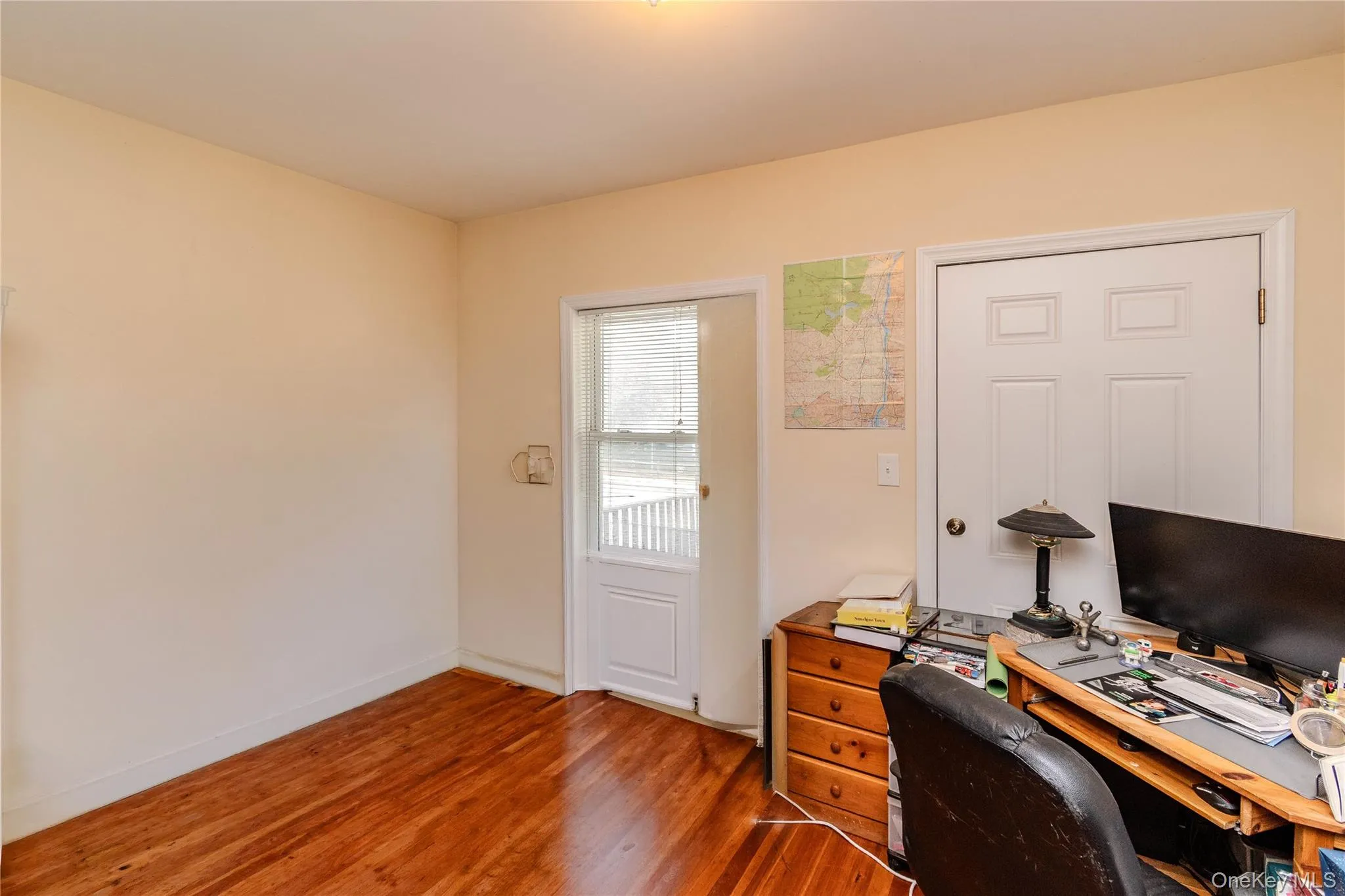 View of 2nd bedroom with hardwood floors View of 2nd bedroom with hardwood floors