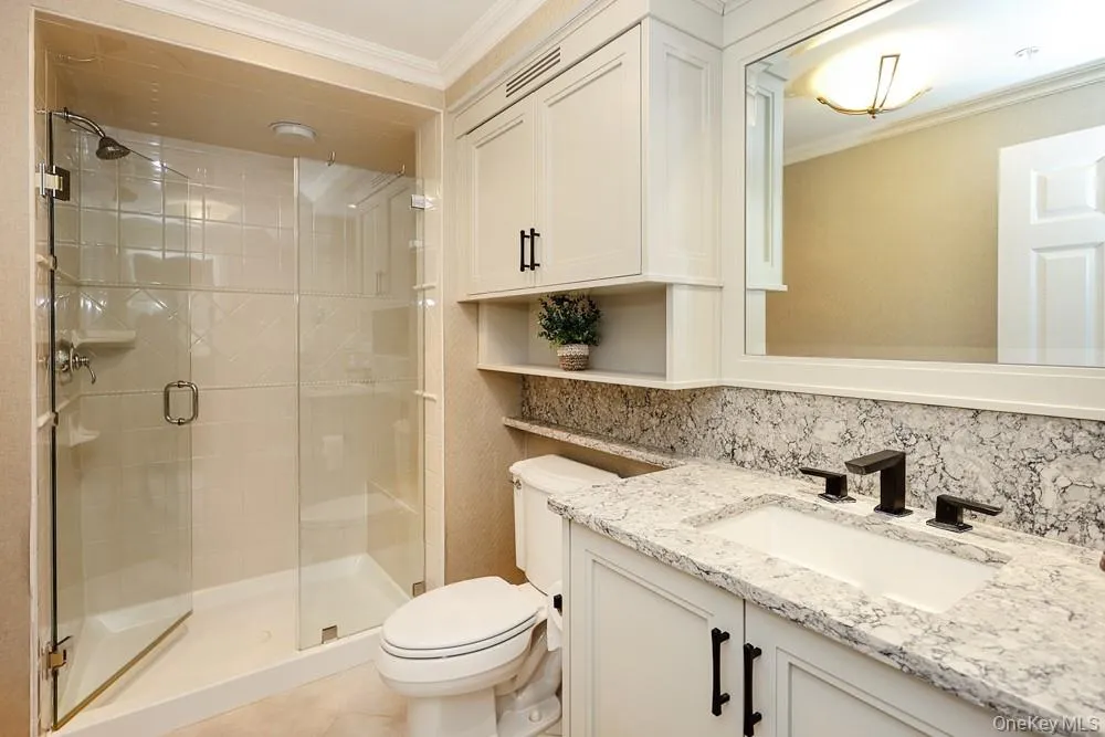 Walk-in shower, custom cabinetry, tons of storage Walk-in shower, custom cabinetry, tons of storage