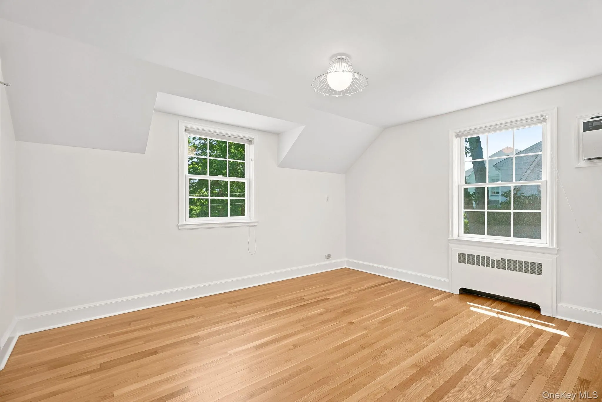 Additional view of second floor bedroom showing two exposures Additional view of second floor bedroom showing two exposures