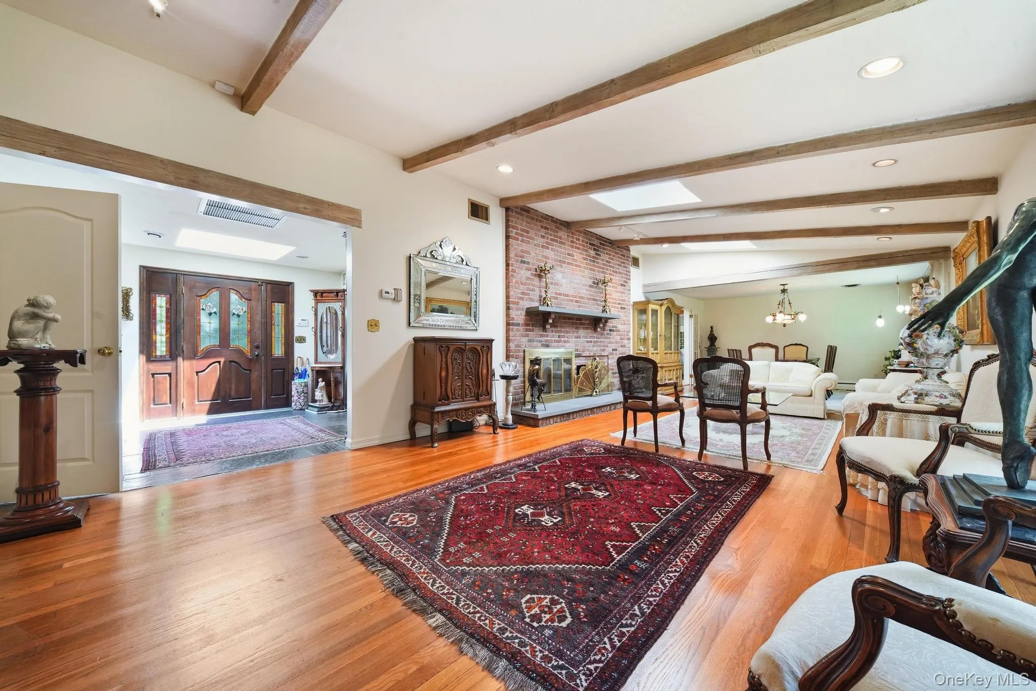 Hardwood flooring extending throughout the space Hardwood flooring extending throughout the space