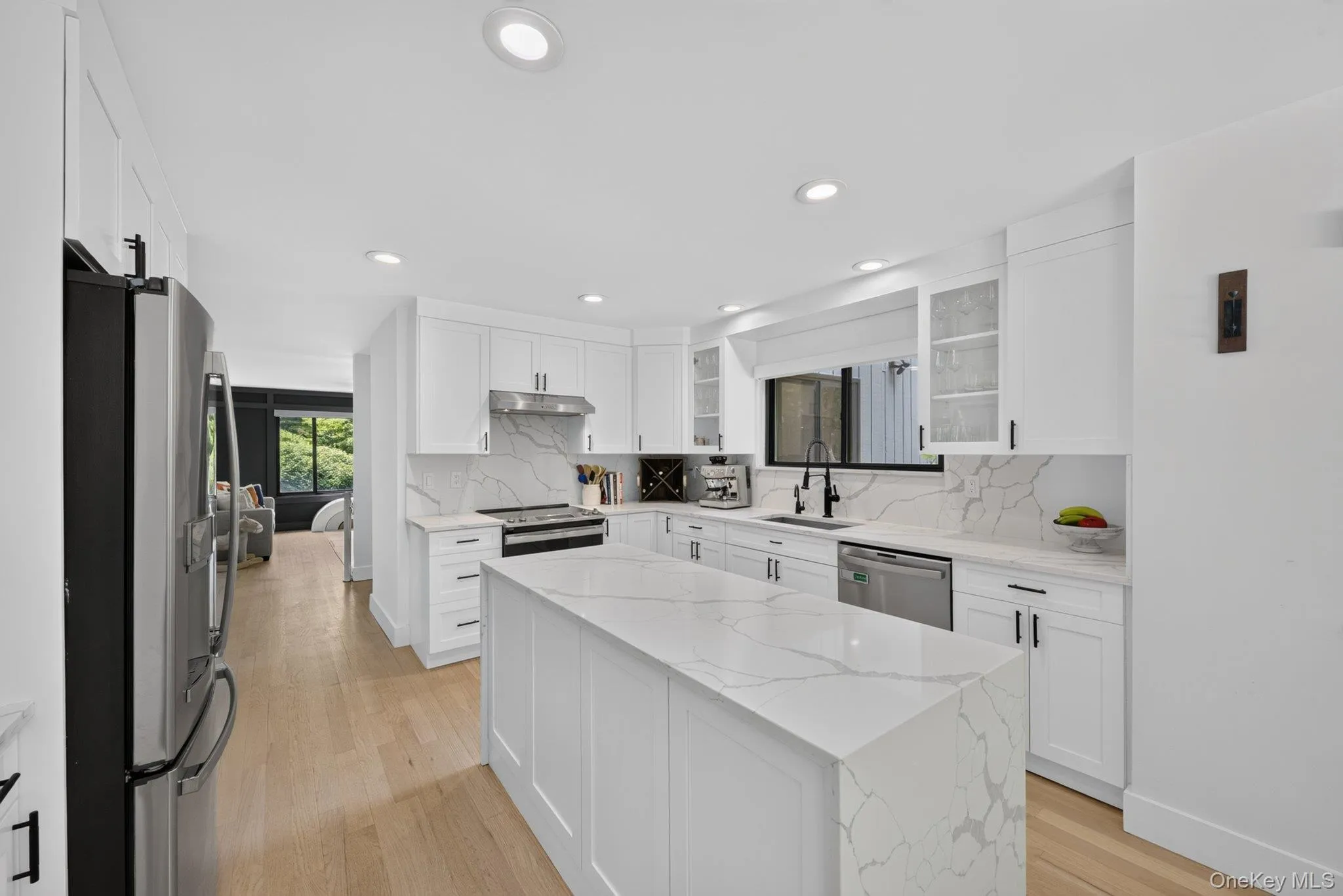 Kitchen opens to Family Room Kitchen opens to Family Room