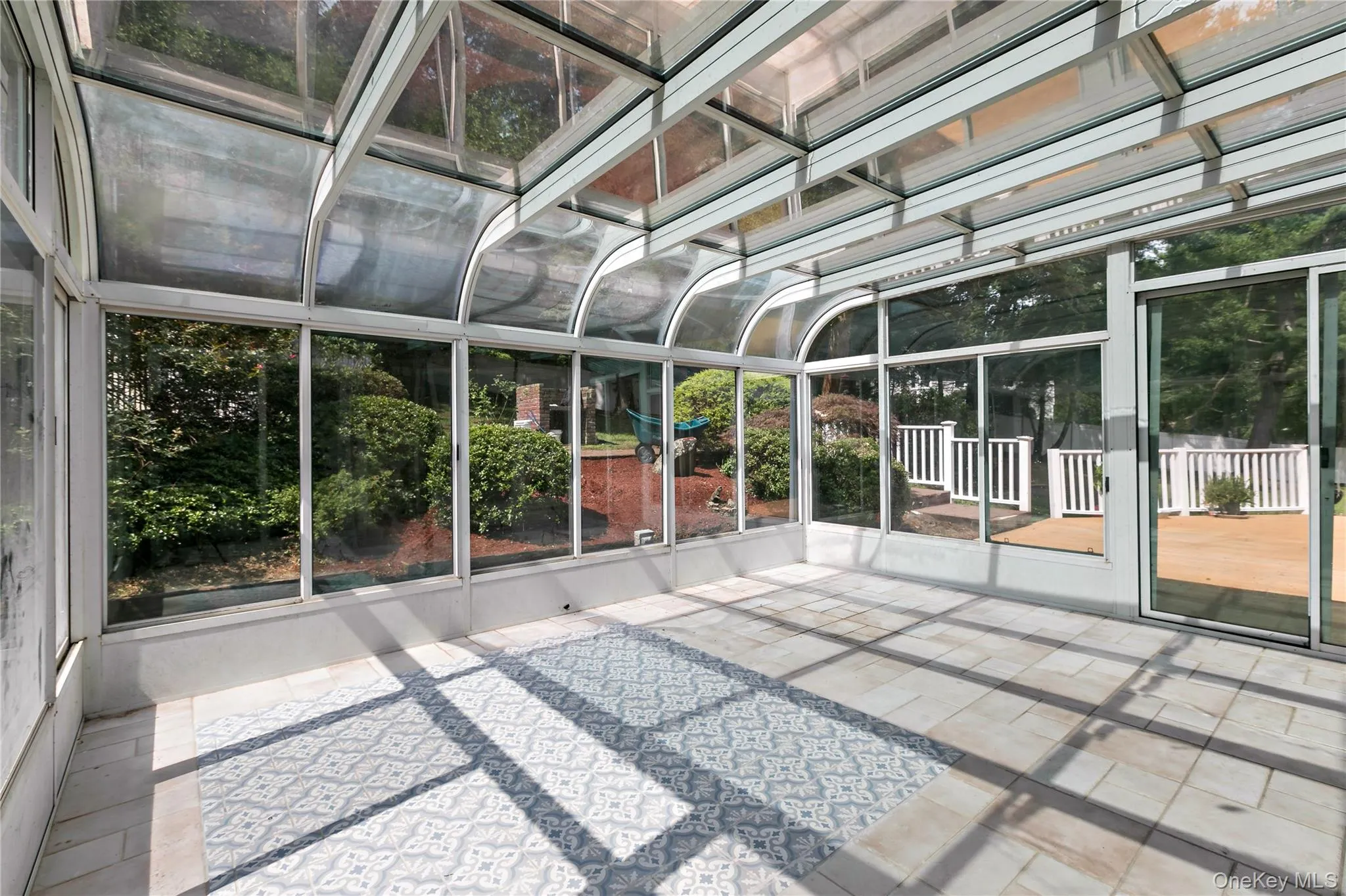 Attached Greenhouse/Sunroom with sliders to deck Attached Greenhouse/Sunroom with sliders to deck