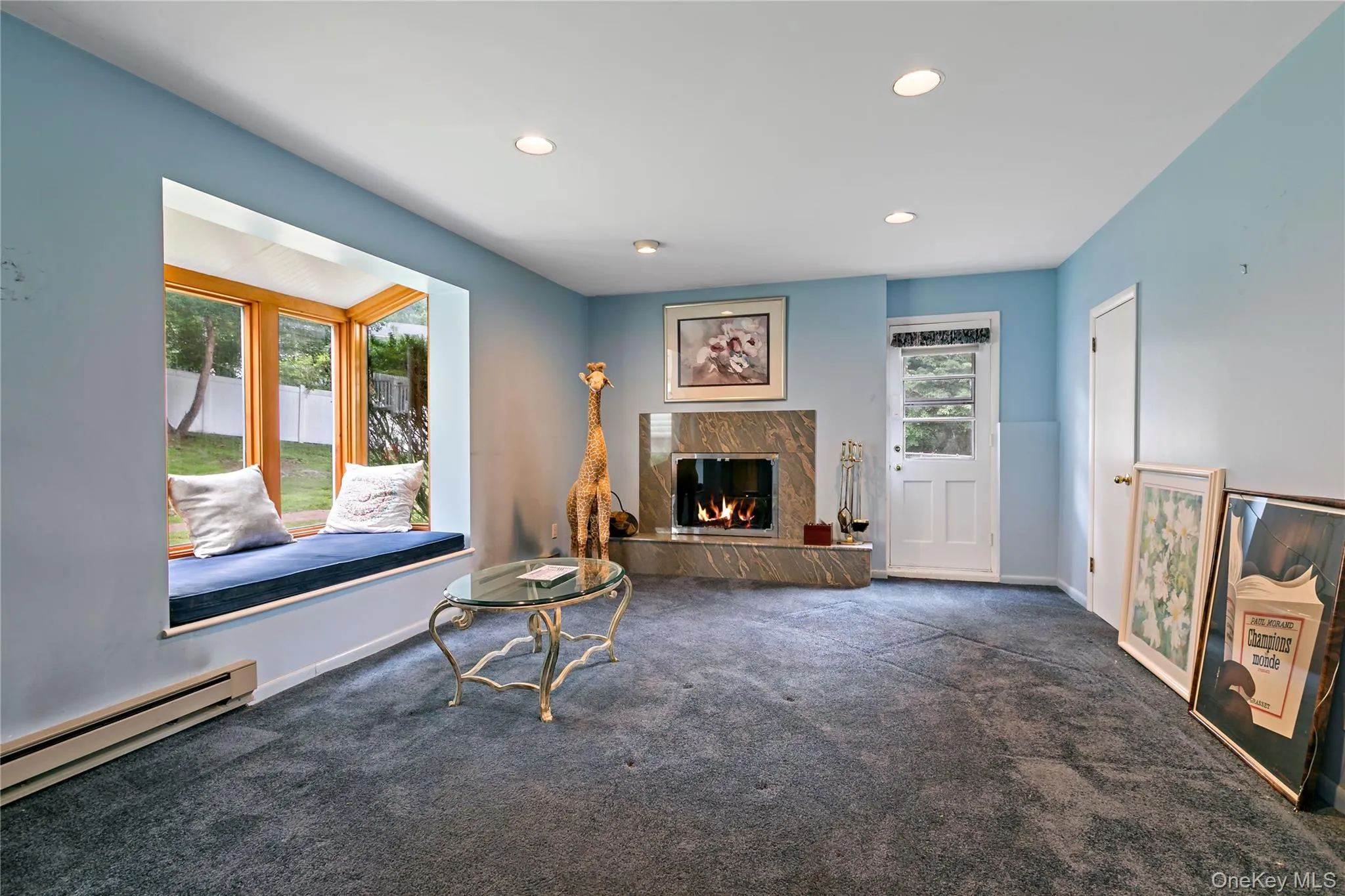 Lower Level is perfect for Guests/In-Law/Nanny. Half bathroom, door to driveway and 2nd door to garage. Fireplace and sunny window seat add to the charm. Flex space/Other options - good for playroom/gaming/theater, exercise, office Lower Level is perfect for Guests/In-Law/Nanny. Half bathroom, door to driveway and 2nd door to garage. Fireplace and sunny window seat add to the charm. Flex space/Other options - good for playroom/gaming/theater, exercise, office