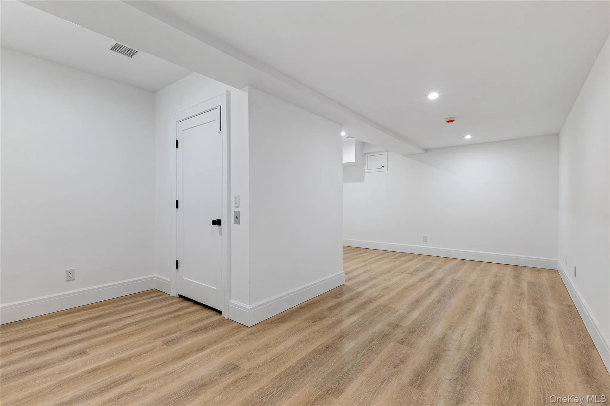 An additional lower-level living area offers endless possibilities as a media room, fitness studio, playroom, or hobby space, with convenient elevator access. An additional lower-level living area offers endless possibilities as a media room, fitness studio, playroom, or hobby space, with convenient elevator access.