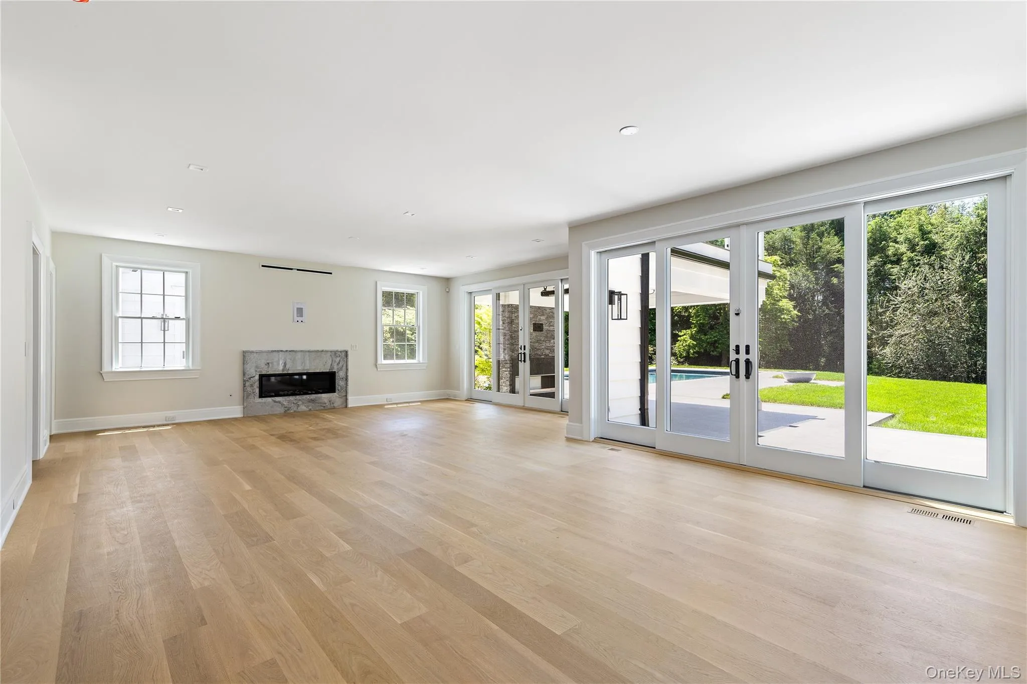 The open-concept layout creates bright, airy gathering spaces that are equally suited to everyday living and large-scale entertaining. The open-concept layout creates bright, airy gathering spaces that are equally suited to everyday living and large-scale entertaining.