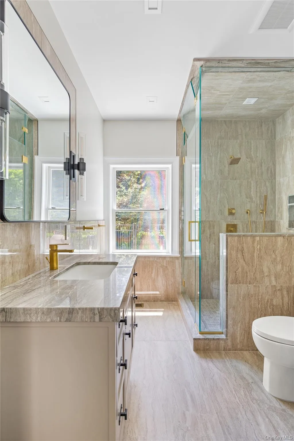 A beautifully appointed full bath with a steam shower serves the indoor pool and adjoining flex space, offering comfort and convenience for family and guests alike. A beautifully appointed full bath with a steam shower serves the indoor pool and adjoining flex space, offering comfort and convenience for family and guests alike.
