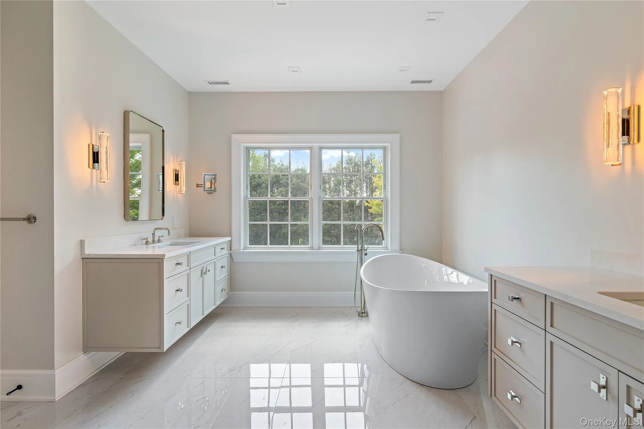 Every detail of the luxurious primary bath has been carefully selected, creating a tranquil retreat with elegant finishes and exceptional craftsmanship. Every detail of the luxurious primary bath has been carefully selected, creating a tranquil retreat with elegant finishes and exceptional craftsmanship.