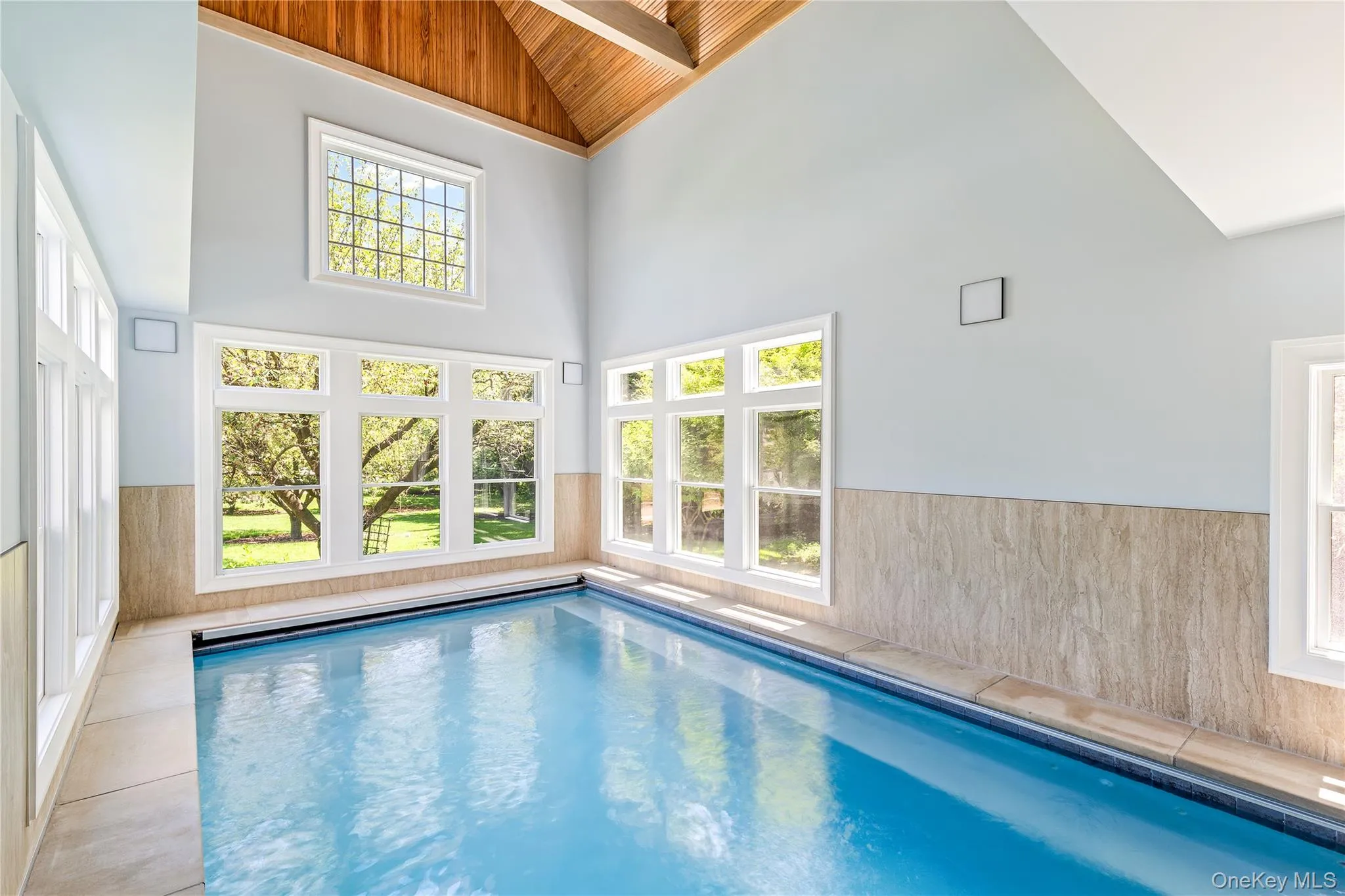 Designed for relaxation and rejuvenation, this extraordinary indoor pool pavilion creates a true spa-like experience in the comfort of your own home. Designed for relaxation and rejuvenation, this extraordinary indoor pool pavilion creates a true spa-like experience in the comfort of your own home.