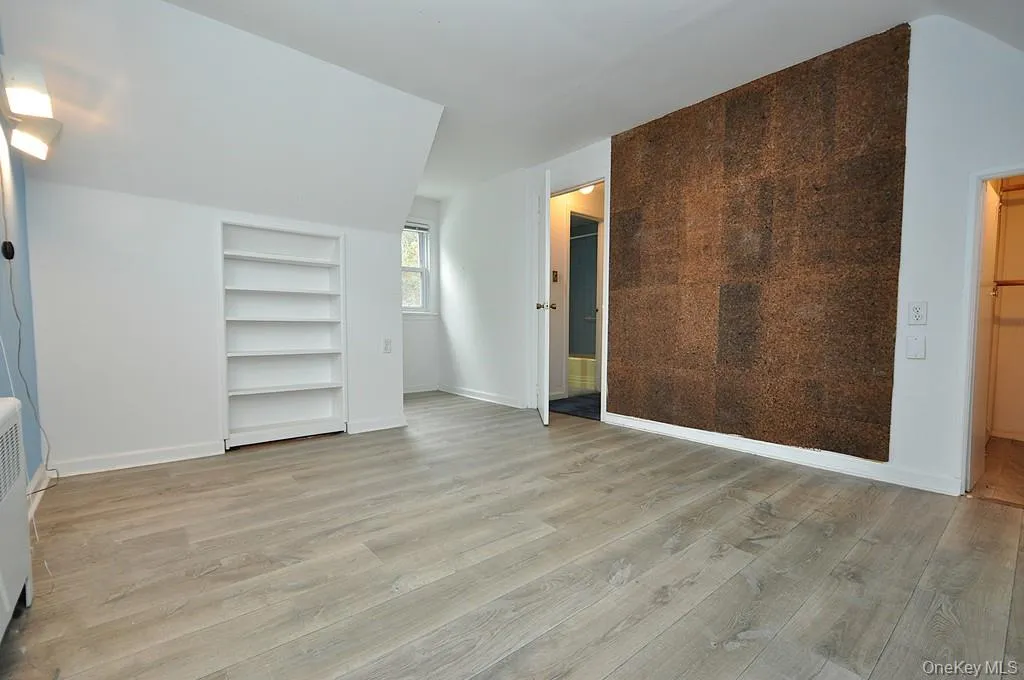 Upstairs Second Bedroom has a large closet and access to additional storage. The bedroom is approx. 17'-5" x 10'-11" . Upstairs Second Bedroom has a large closet and access to additional storage. The bedroom is approx. 17'-5" x 10'-11" .