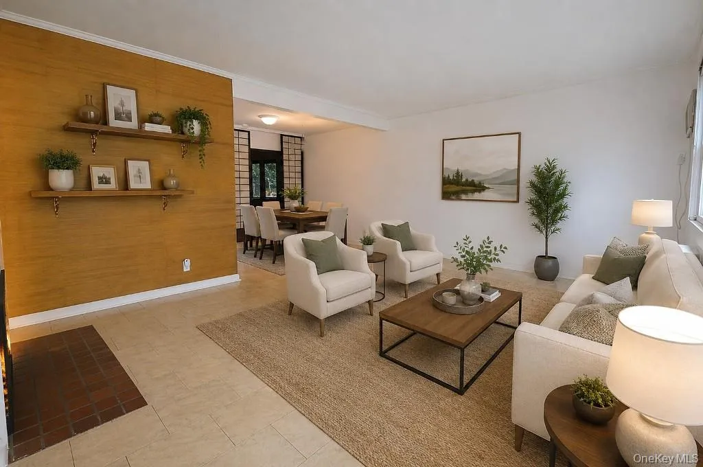Photo Visually Staged. The living room has a large picture window, fireplace and opens to the dining room. The Living room is approx 22'-9" x 13'-1" and the dining area is 10'-2" x 8'-11". Photo Visually Staged. The living room has a large picture window, fireplace and opens to the dining room. The Living room is approx 22'-9" x 13'-1" and the dining area is 10'-2" x 8'-11".