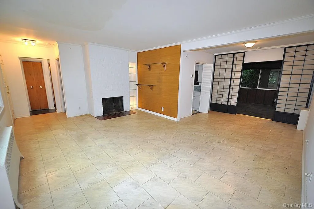 The living room has a large picture window, fireplace and opens to the dining room. The Living room is approx 22'-9" x 13'-1" and the dining area is 10'-2" x 8'-11". The living room has a large picture window, fireplace and opens to the dining room. The Living room is approx 22'-9" x 13'-1" and the dining area is 10'-2" x 8'-11".
