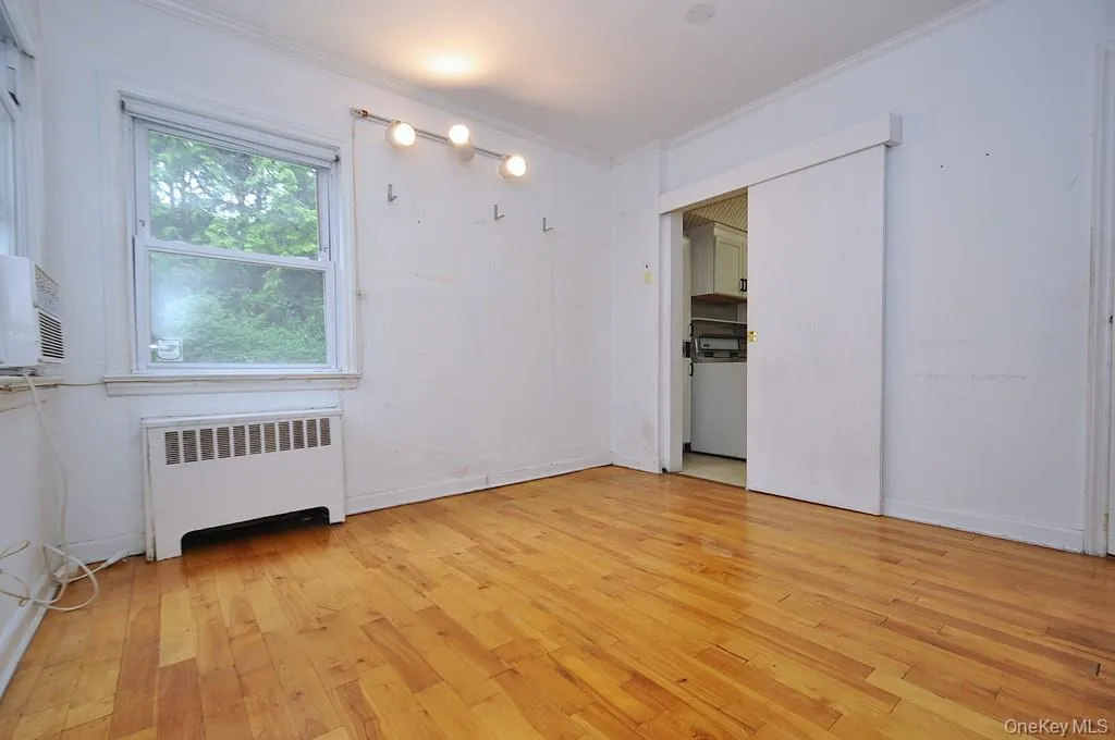 The fourth bedroom is located on the main level and can be used as a den / home office / guest room. The room is approx 12'-8" x 10'-11". The fourth bedroom is located on the main level and can be used as a den / home office / guest room. The room is approx 12'-8" x 10'-11".